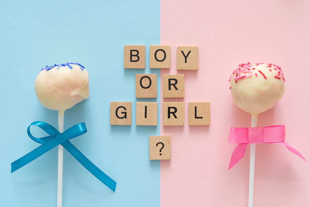 Gender reveal party concept - where parents and friends find out the  of the baby